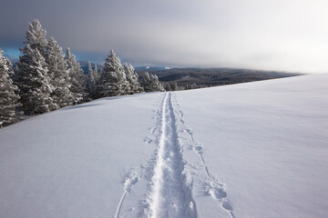 View of snowy landscape against sky