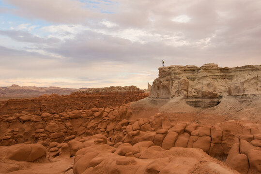 Hiker overlooking Goblin Valley State Park