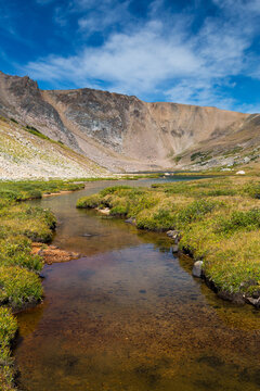Scenic view of Gardner Lake against Beartooth Mountains in forest