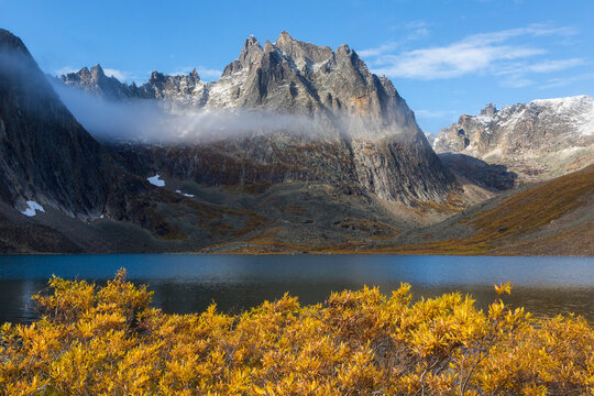 View Of Grizzly Lake With Mountain In Background In Morning