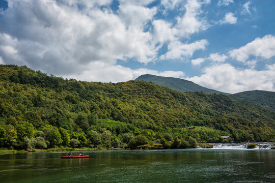 Paddlers canoeing in Una River in Bosnia Herzegovina