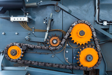 Mechanism with gears in orange. Gearing concept. Cogwheels machinery, engineering and industry. Teamwork concept.