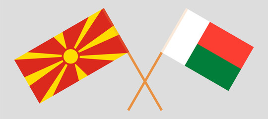 Crossed flags of North Macedonia and Madagascar