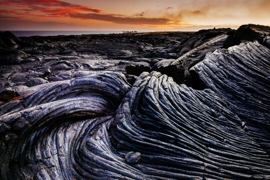 View of volcanic rock during sunset