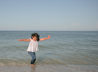 flying like an airplane on the beach 
