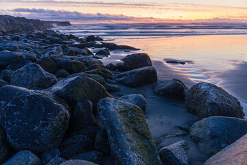 Rocky Coastline of Ocean Beach at Sunset