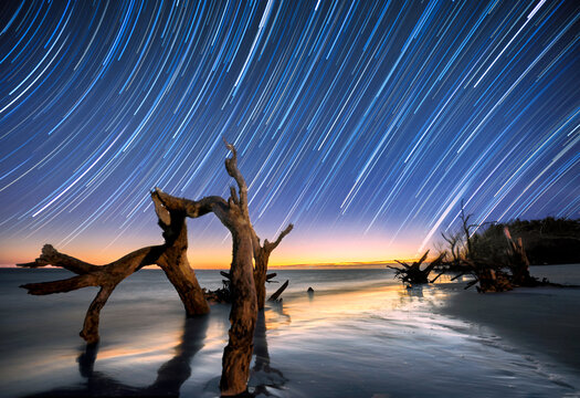 View of star trail over Folly Beach