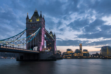 Scenic view of Tower bridge over River Thames at dusk