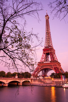 View of Eiffel Tower above River Seine during sunset