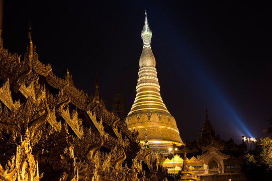 Exterior view of Sule Pagoda against sky at night