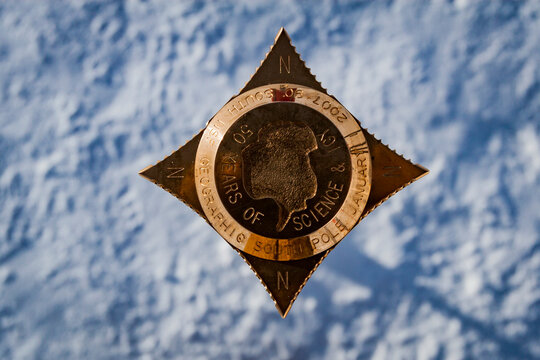 Close up of south pole marker