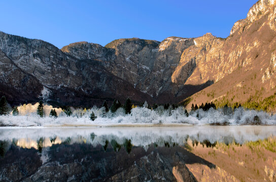 View of mountains reflecting in Lake Bohinj