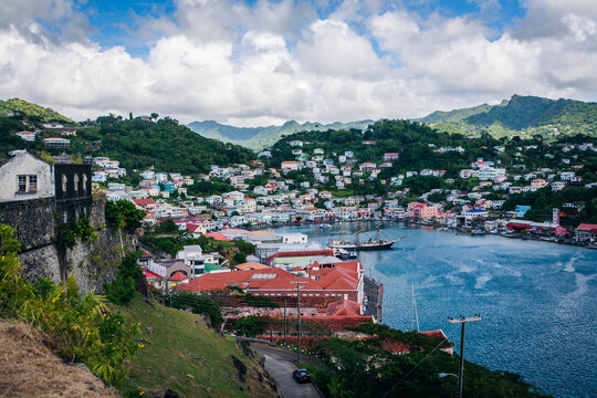 Scenic view of town and harbor on coastline
