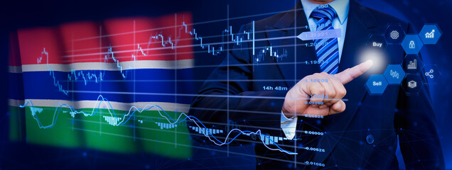 Businessman touching data analytics process system with KPI financial charts, dashboard of stock and marketing on virtual interface. With Gambia flag in background.