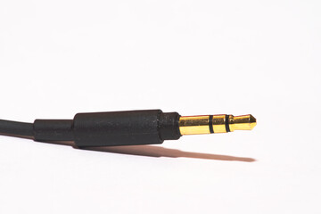 Fototapeta premium audio cable with 3.5 mm jack isolated on white