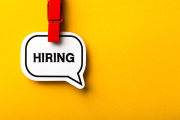 Hiring Business Concept On Yellow Background