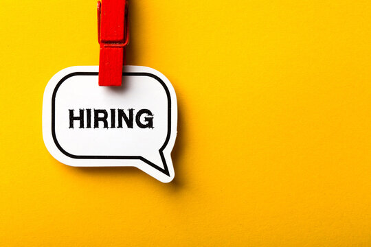 Hiring Business Concept On Yellow Background