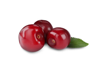 Tasty ripe red cherries with green leaf isolated on white