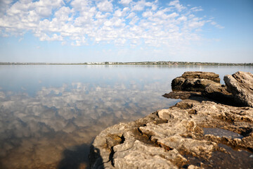 Beautiful view of tranquil sea and rocks on sunny day. Nature healing concept