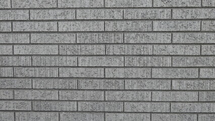 grey brick wall background texture or wallpaper