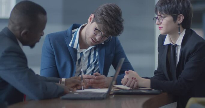 Multicultural business meeting, shallow focus, selective focus