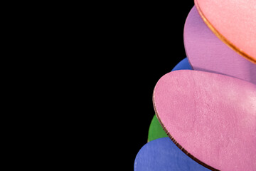 Abstract Colorful Wooden Ovals in Darkness
