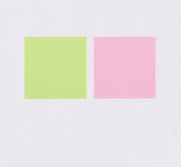 Colorful square note paper on white paper background.