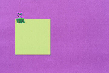Note paper on purple background.