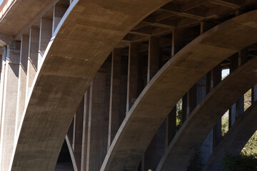 Under an arched bridge
