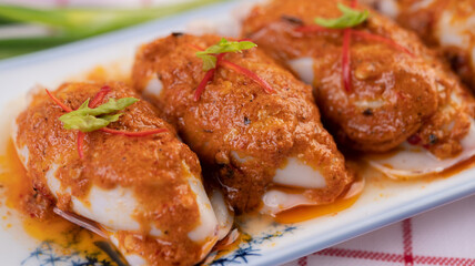 Chu che squid with spring onion, tomato, lemon and chili.