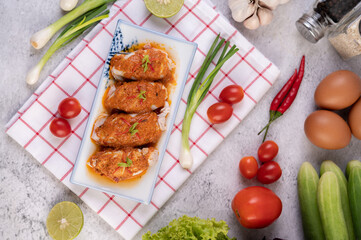 Chu che squid with spring onion, tomato, lemon and chili.