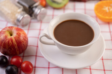 Coffee with apples Grapes and tomatoes.
