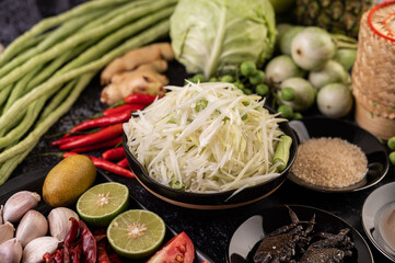 Papaya salad ingredients include papaya.