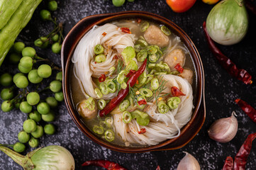 Rice noodle and coconut milk solution.