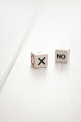 'YES' or 'NO' and 'X' or 'O' dice