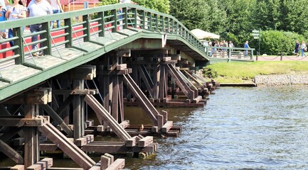 Old wooden bridge over the river