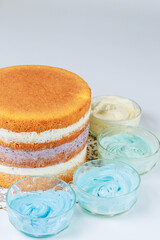 Beautiful layered cake with frosting on white isolated background.