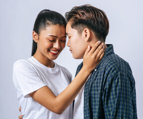 The woman of two lovers stood and looked down.