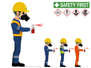 An industrial worker with respirator is spraying color