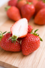 strawberries on cutting board