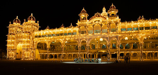 musicians performing at mysore palace at night