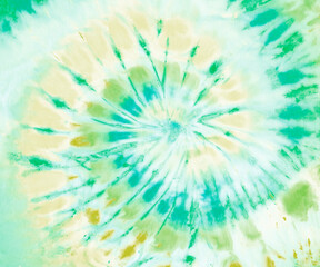 Obraz premium Spiral tie dye pattern wallpaper background in green and tan.