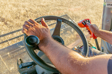In the cab of a combine harvester during the wheat harvest