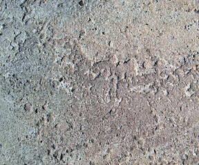concrete surface with protruding small stones