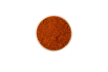 Paprika in a bowl isolated on white background.