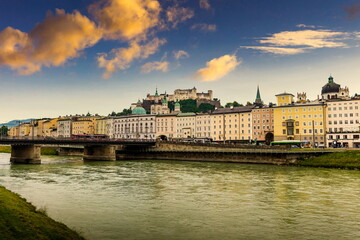 Fototapeta premium Sunset over Salzburg town. Salzach river. Austria.