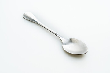 silver spoon on white background