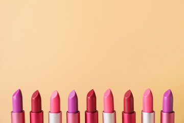 Different lipsticks on color background