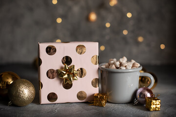 Mug for mockup near christmas tree and gift boxes