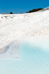 Natural travertine pools and terraces at Pamukkale ,Turkey. Pamukkale, meaning cotton castle in Turkish.